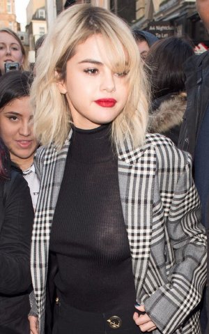 Selena-Gomez-Suffers-Nightmare-Wardrobe-Fail-As-Cameras-Flash-Turn-Top-See-Through.jpg