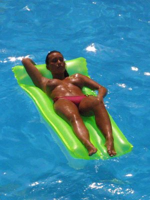 lucinda-rhodes-flaherty-sunbathing-topless-shows-her-nude-boobs-4x2.jpg