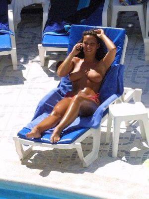lucinda-rhodes-flaherty-sunbathing-topless-shows-her-nude-boobs-3x2.jpg